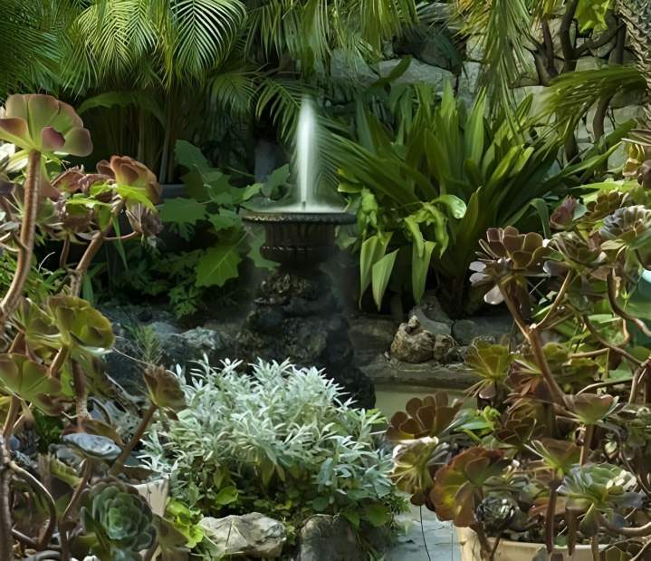 Magnifique jardin luxuriant avec une fontaine Nice
